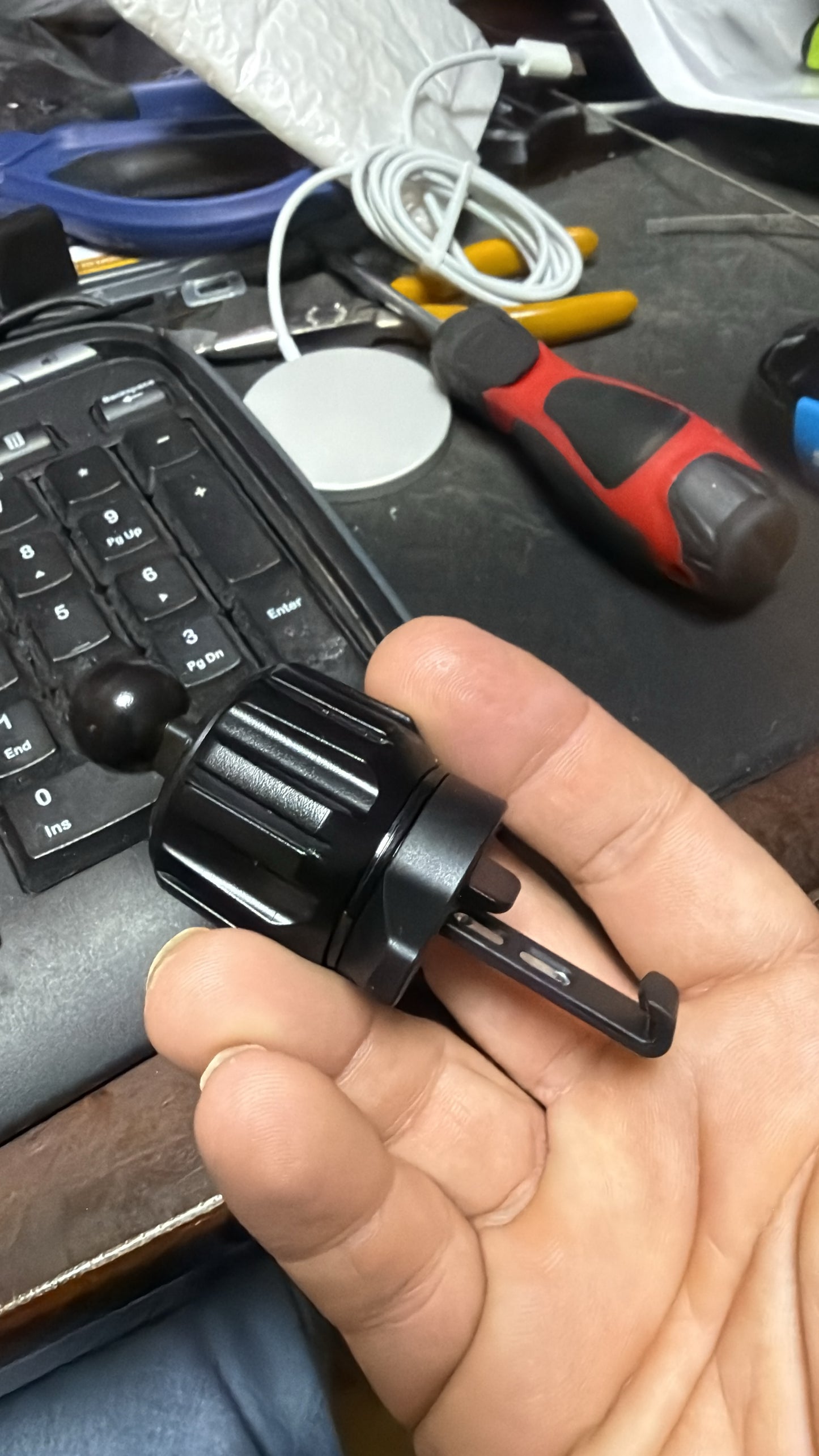 Wireless car charger mount with 17mm ball showing example of AC vent mount